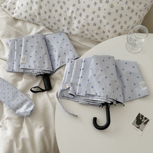 DameFaltparaply med robust mekanisme og stillegant design Skanto