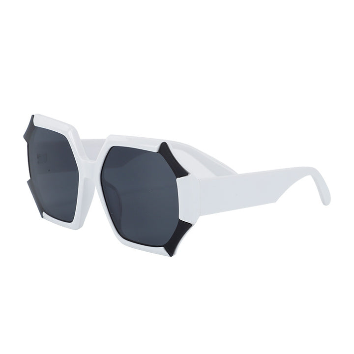 Dame moterelatert solbrille med fasettert ramme Skanto