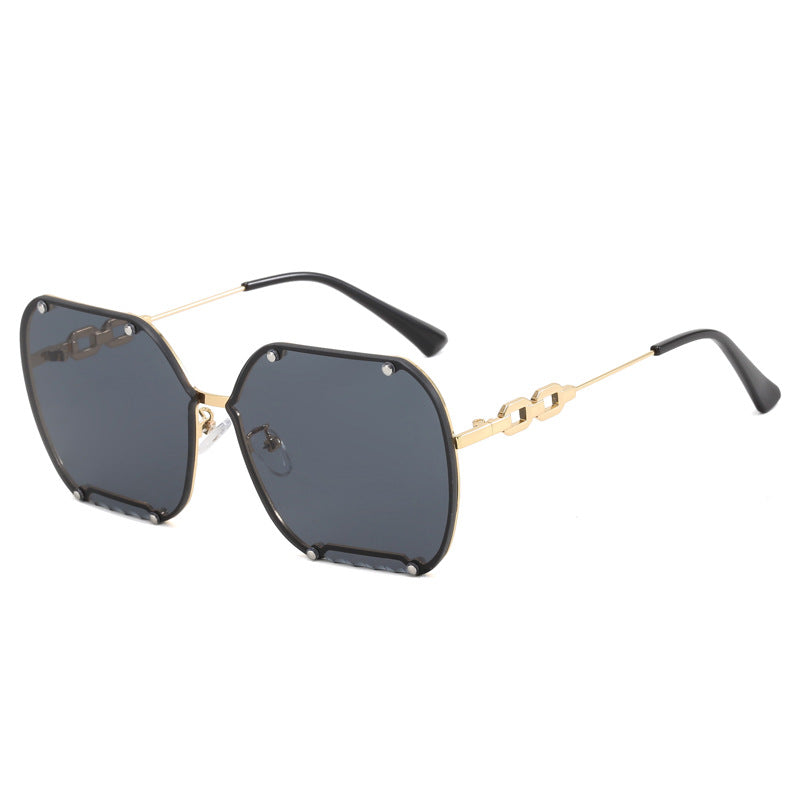 Dame elegant sekskantet designer-solbrille med luksuriøse aksenter Skanto