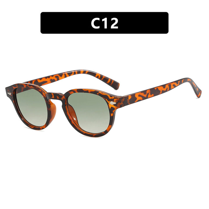 Dame rund solbrille med elegant design og UV-beskyttelse Skanto
