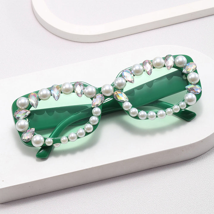 Damer elegant solbrille med perlepynt Skanto