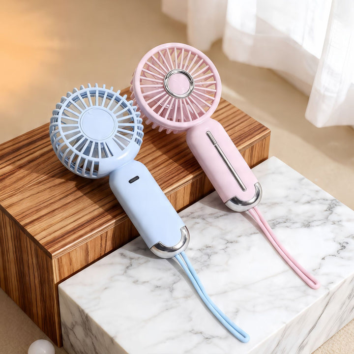 Dame bærbar mini-vifte med USB-ladefunksjon og ergonomisk design Skanto