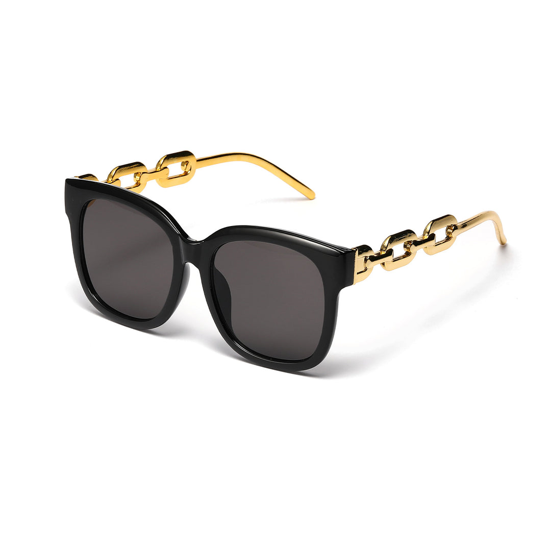 Dame moteriktig oversized solbrille med luksuriøs kjedeinnramming Skanto