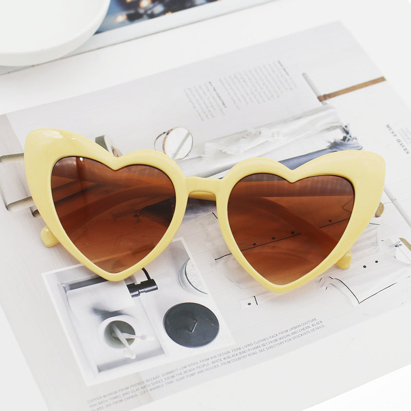 Dame hjerteformet solbrille med glitrende ramme Skanto