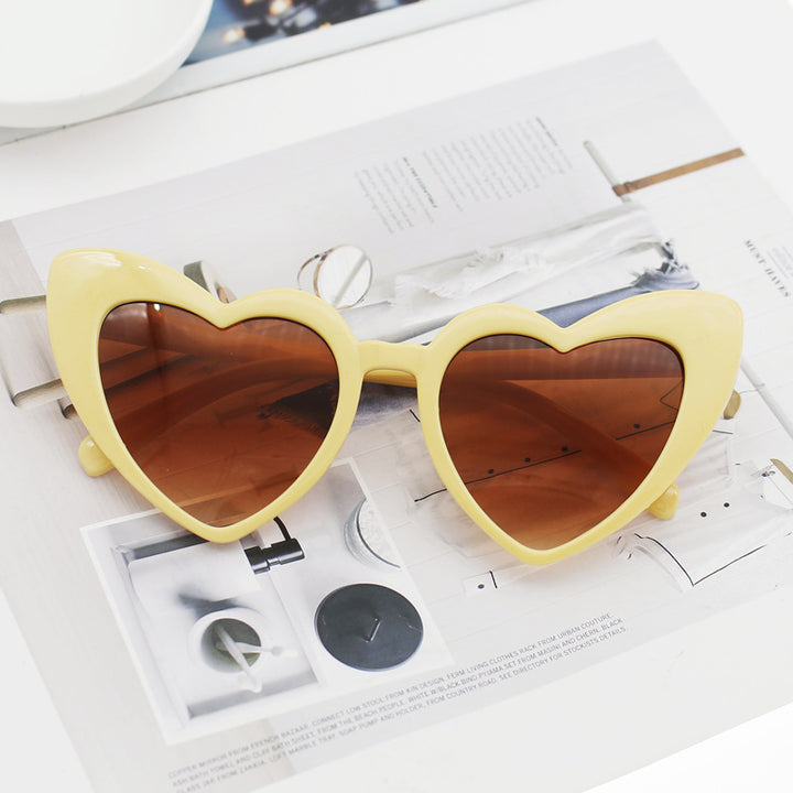 Dame hjerteformet solbrille med glitrende ramme Skanto