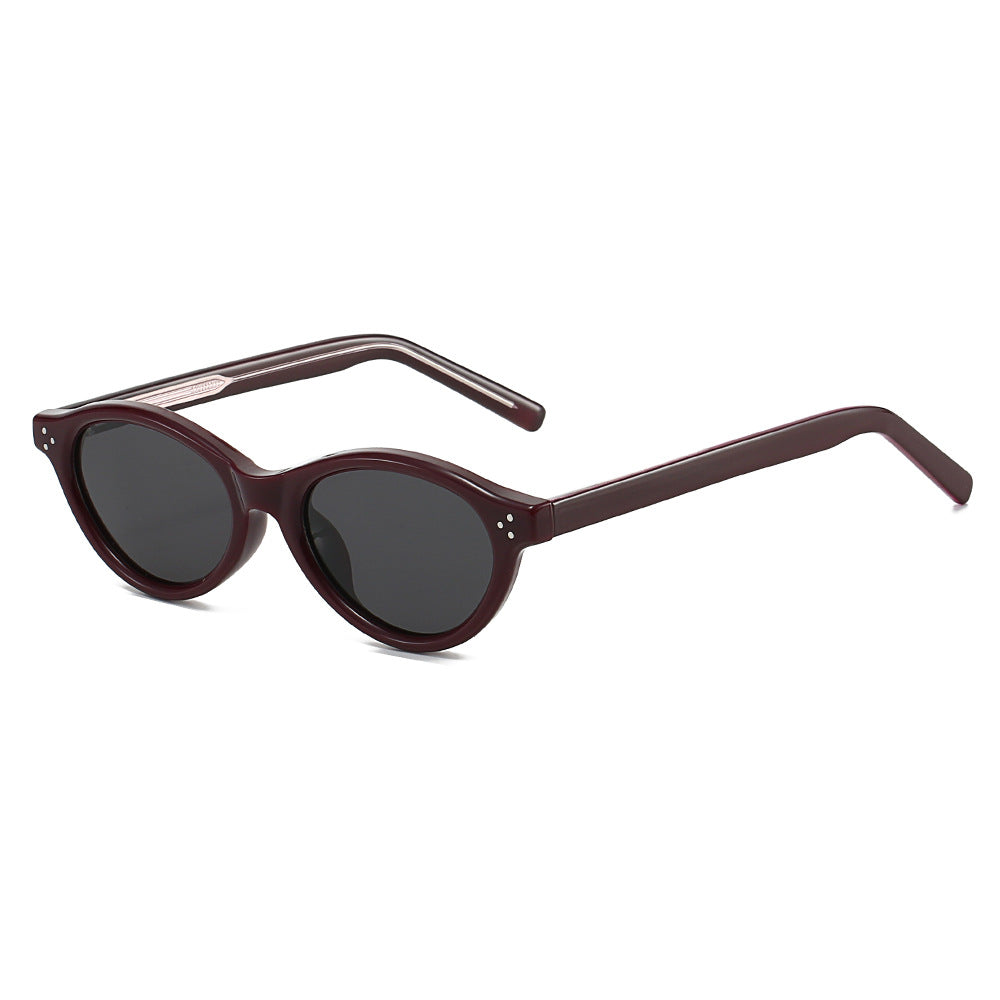 Dame Cat-Eye solbriller med elegant, transparent ramme og UV400-beskyttelse Skanto