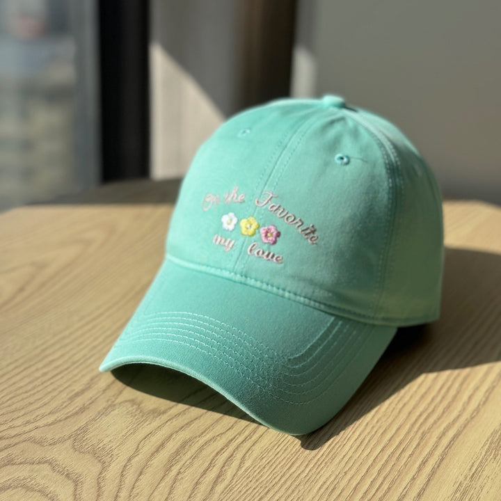 Kvinners broderte tekstlue Skanto