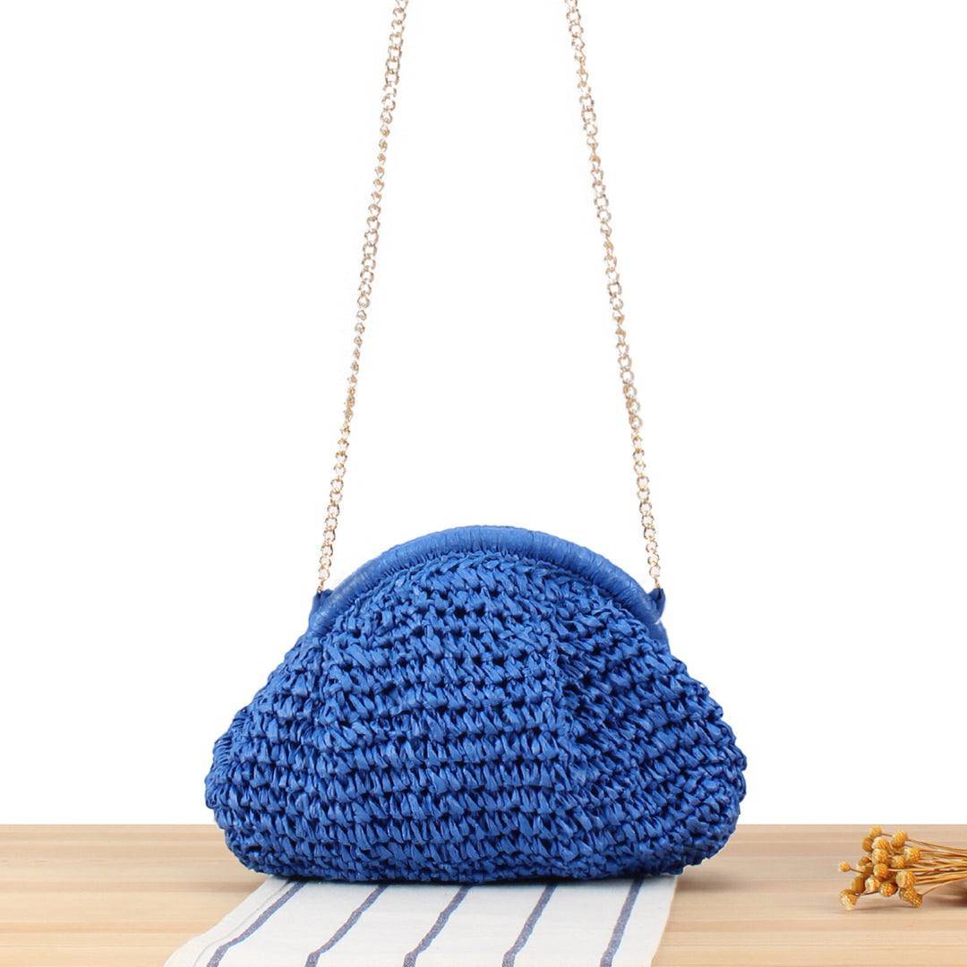 Shoulder bag made of handmade natural fibers with elegant chain embellishment Skanto