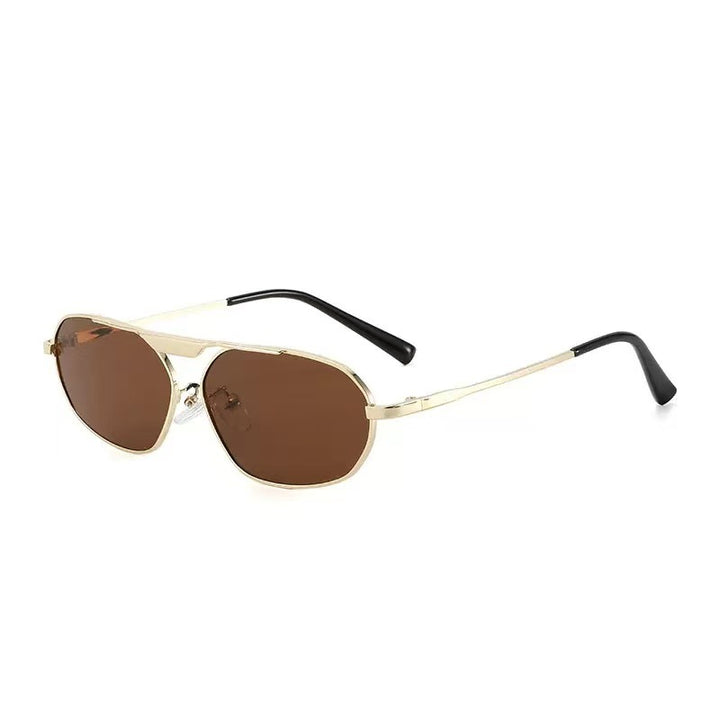 Dame moteriktig solbrille i elegant polygon-design Skanto