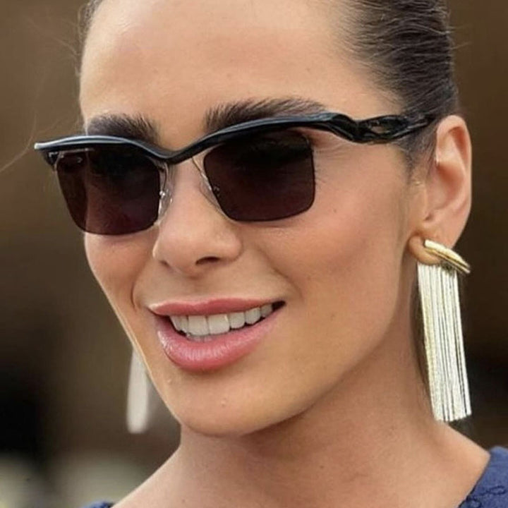 Damer sporty solbrille med aerodynamisk design og komfortabel bæreopplevelse Skanto