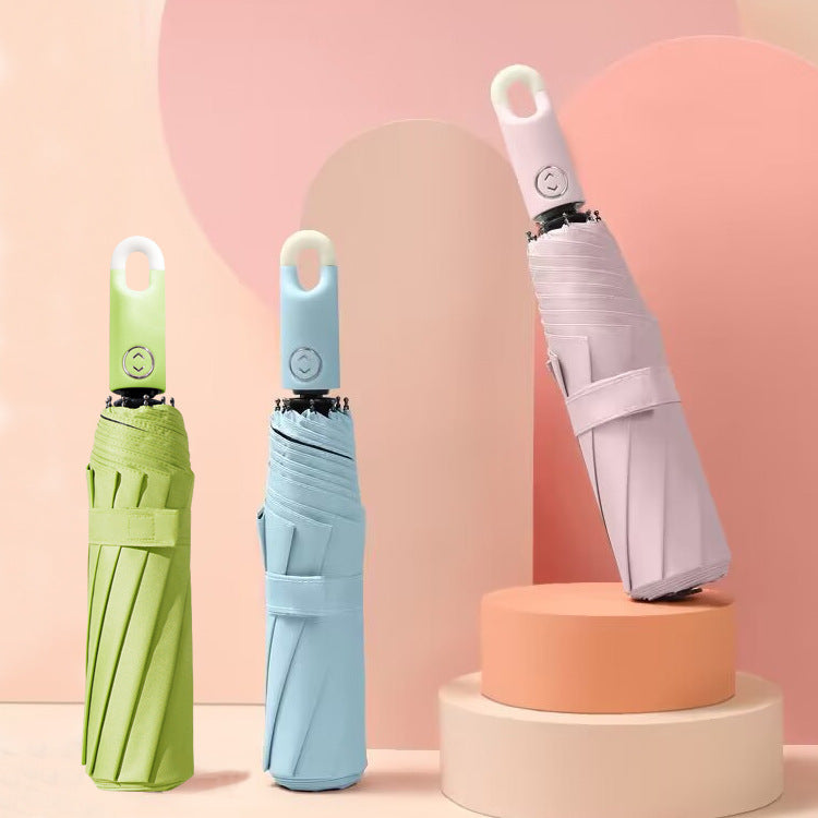 Dame elegant foldes regnparaply med ergonomisk håndtak og UV-beskyttelse Skanto