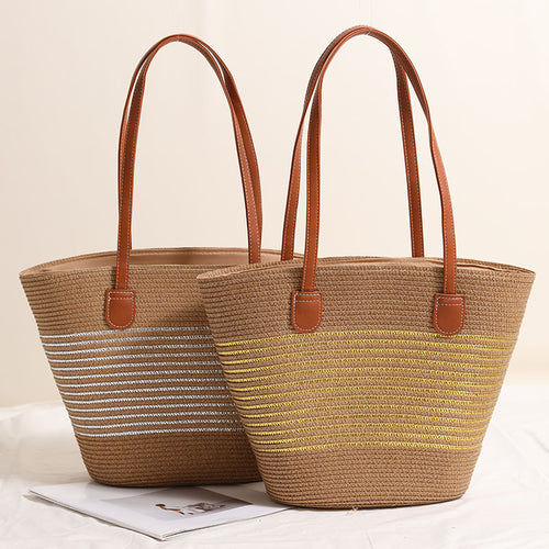 Elegant Bastbag med skinnaksenter Skanto