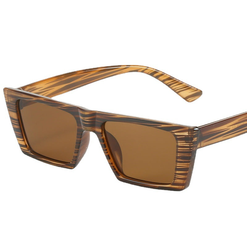 Dame geometrisk solbrille med trendy, firkantet ramme Skanto