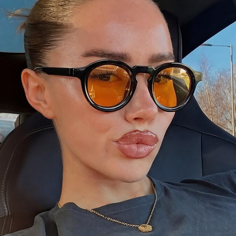 Damer fashionable runde solbriller med transparent ramme og UV-beskyttelse Skanto