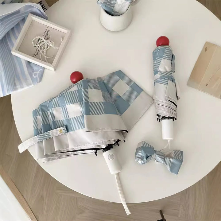 Dame sammenleggbart paraply med spesiell design Skanto