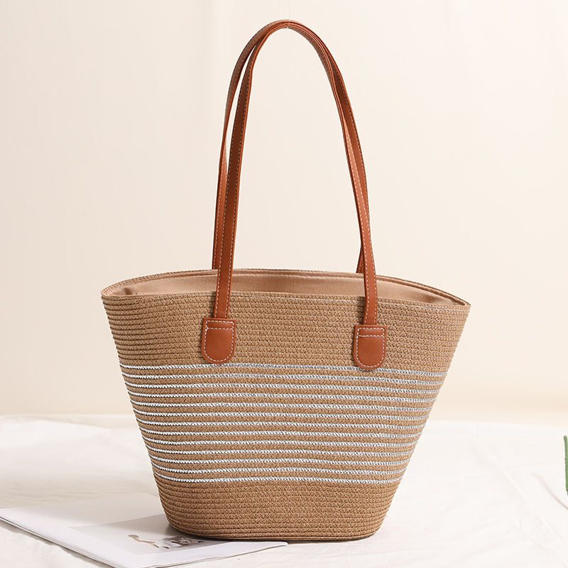 Elegant Bastbag med skinnaksenter Skanto