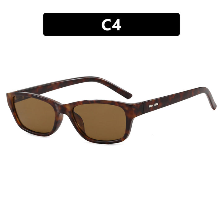 Dame solbrille i moderne, kantete design Skanto