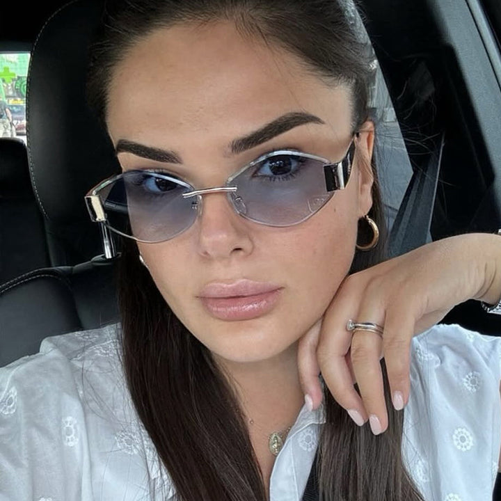 Dame motemessig solbrille med elegant åttekantet ramme og UV-beskyttelse Skanto