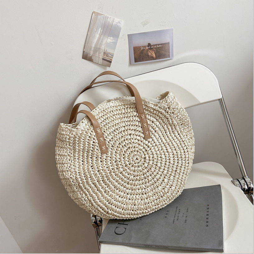 Håndlaget rundstrandbag Skanto