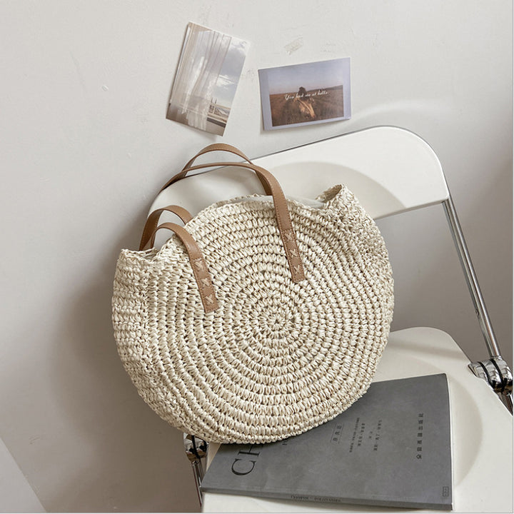 Håndlaget rundstrandbag Skanto