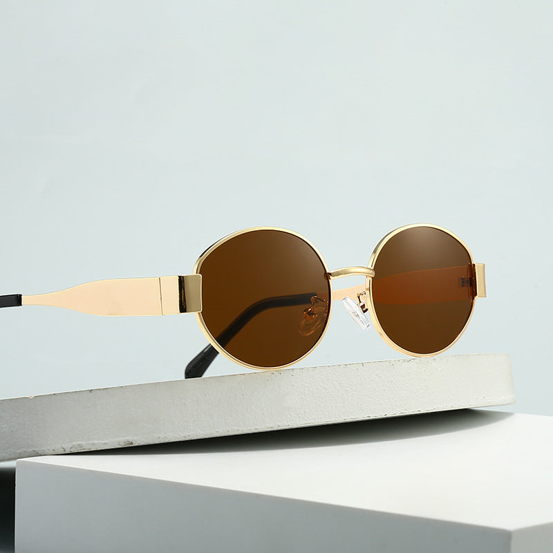 Dame motesik oval solbrille med unik ramme Skanto