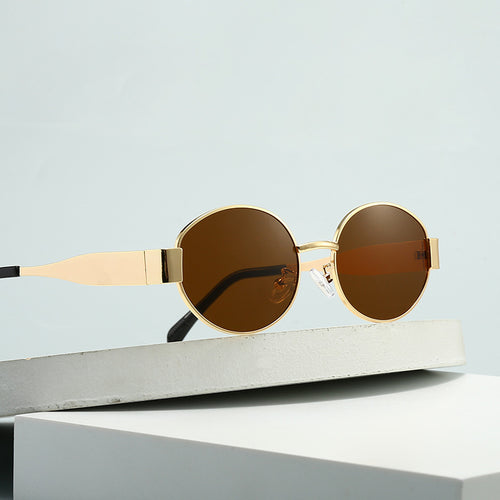 Dame motesik oval solbrille med unik ramme Skanto