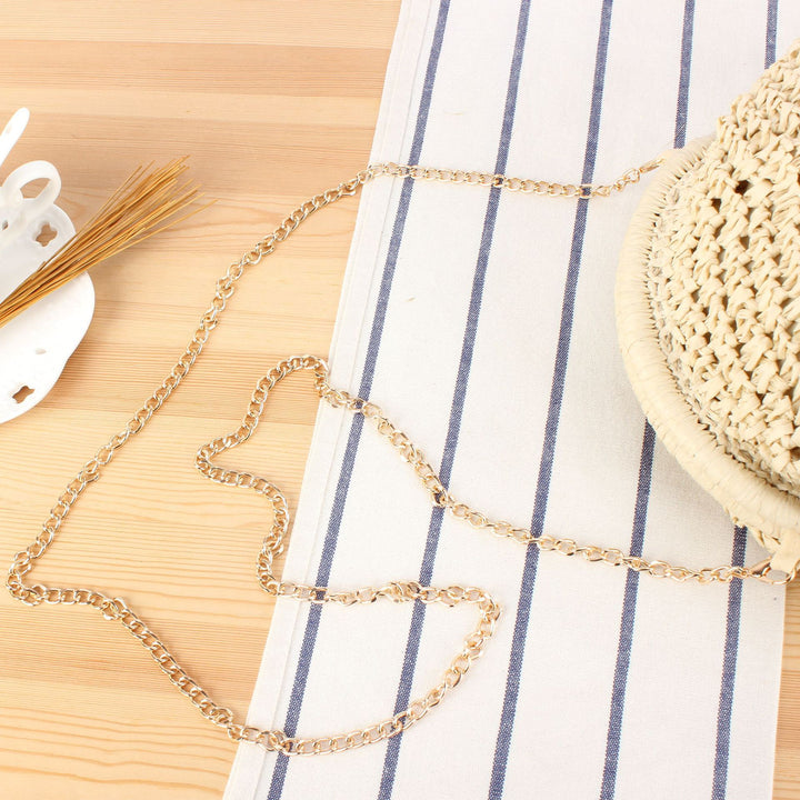 Shoulder bag made of handmade natural fibers with elegant chain embellishment Skanto