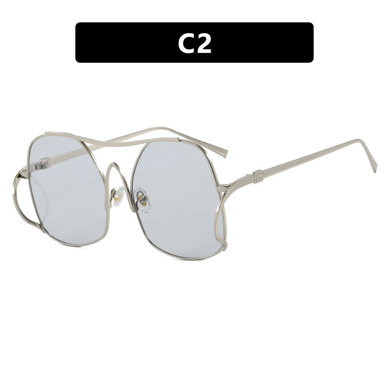 Dame geometrisk solbrille med smal metallramme og brune glass Skanto