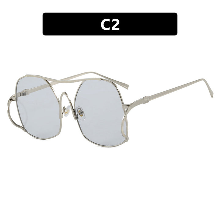 Dame geometrisk solbrille med smal metallramme og brune glass Skanto