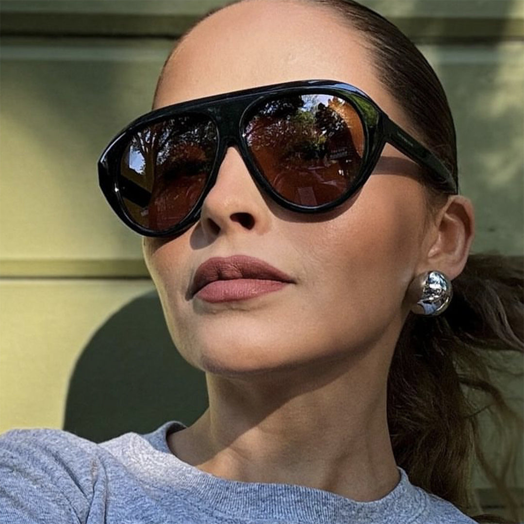 Damer oversized solbriller med stilfull design og beskyttende UV-filter Skanto