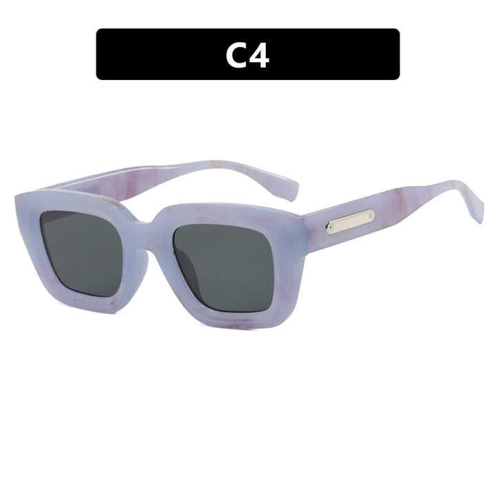 Dame kvadratisk solbrille med gjennomsiktig ramme og brune glass Skanto