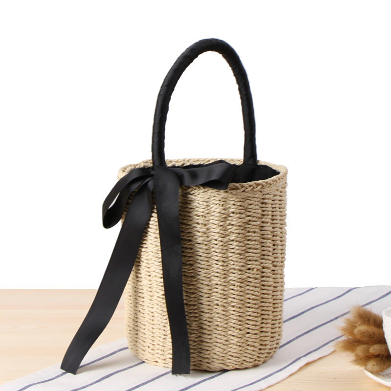 Modern basket bag with decorative satin ribbon Skanto