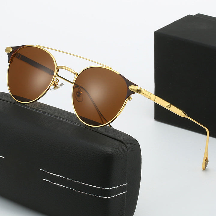 Dame rund Vintage-solbrille med høykvalitets metallramme og robust design Skanto