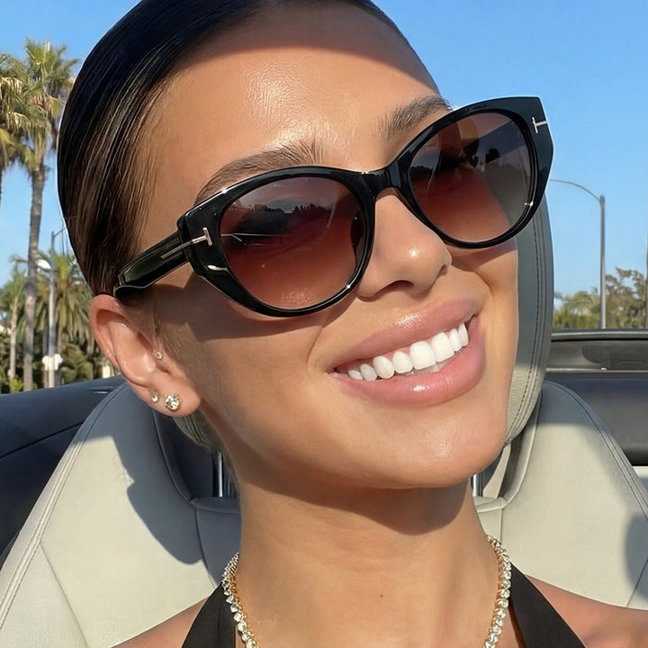 Damer Cat-Eye solbriller med elegant ramme og beskyttende UV-filter Skanto