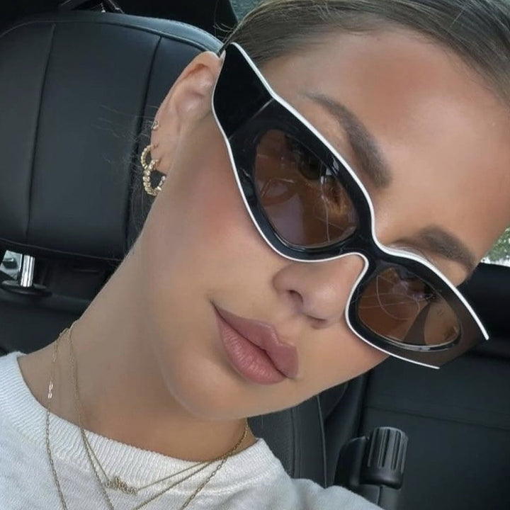 Dame Cat-Eye solbriller med ekstravagant design og beskyttende UV-filter Skanto