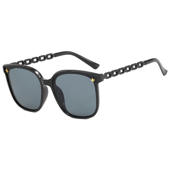 Dame moteriktig solbrille med stilige kjedeakenter Skanto