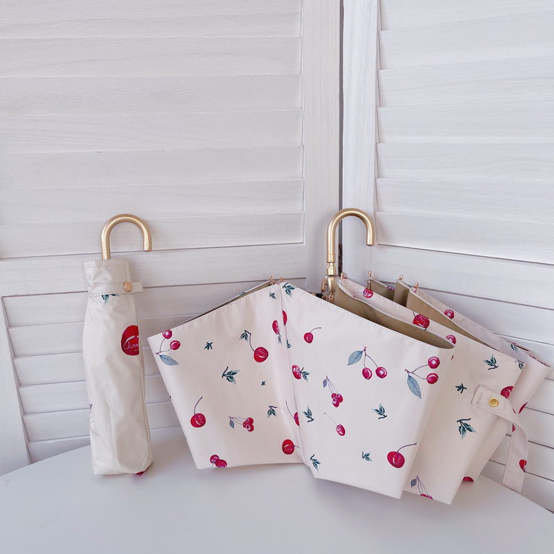 Dame elegant foldbar paraply med fruktig design Skanto
