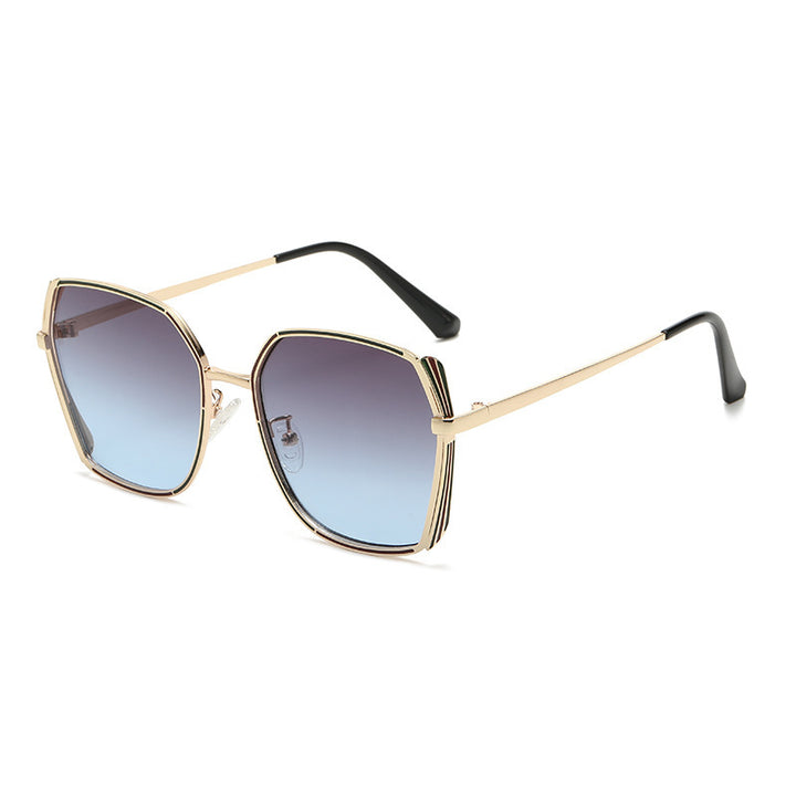 Dame stor og elegant solbrille Skanto