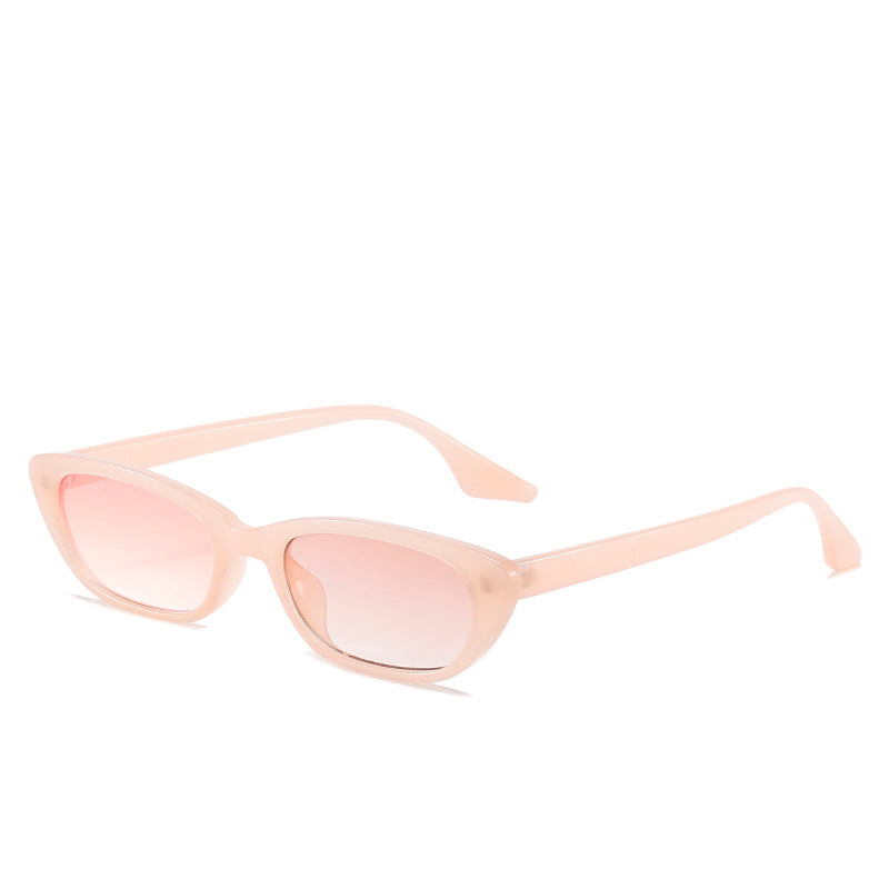 Dame moderne solbriller i trendy cat-eye-stil med gjennomsiktig ramme Skanto