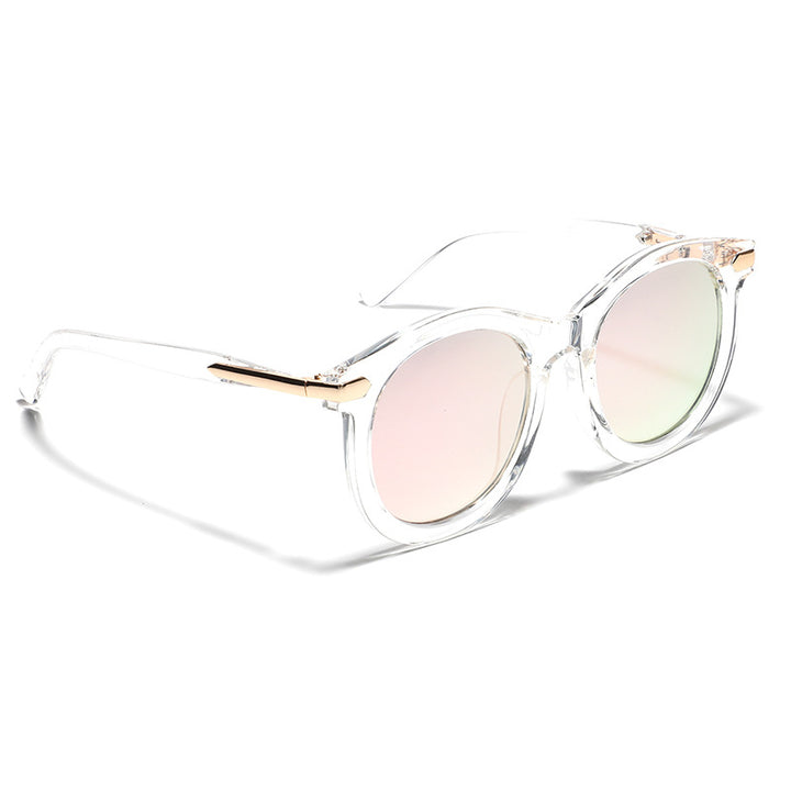 Dame moteriktig solbrille med gjennomsiktig ramme og gull accenter Skanto