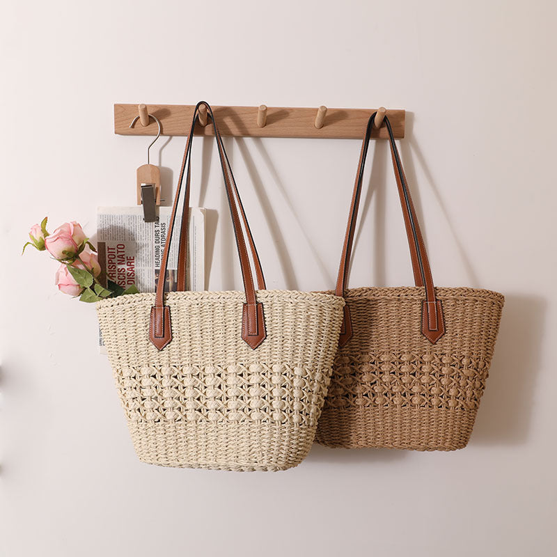 Håndlaget rattan kurvveske med elegante lærdetaljer Skanto