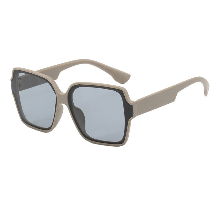 Dame kvadratisk solbrille med unik, stilfull ramme Skanto