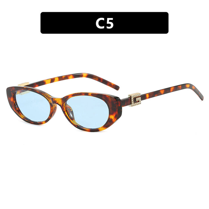 Damer cat-eye solbrille med elegant metallramme og beskyttende UV-filter Skanto