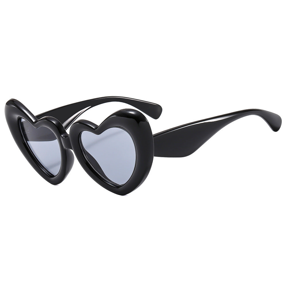 Dame Hjerteformet Solbrille med stilfull innramming Skanto