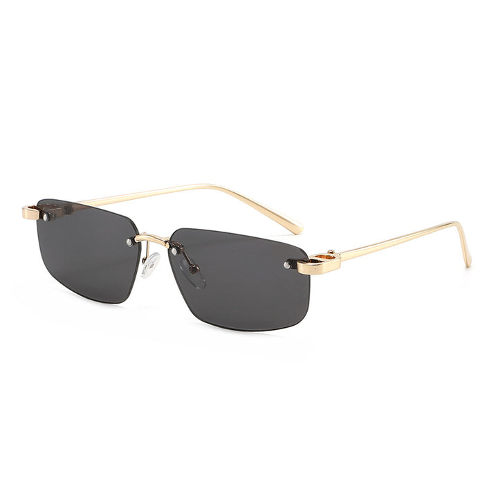 Dame moteriktig rektangulær solbrille med minimalistisk ramme Skanto