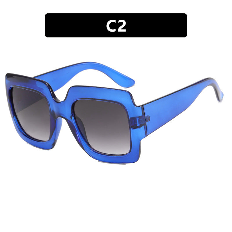 Dame oversized kvadratisk solbrille med markant skjoldpatt-design Skanto