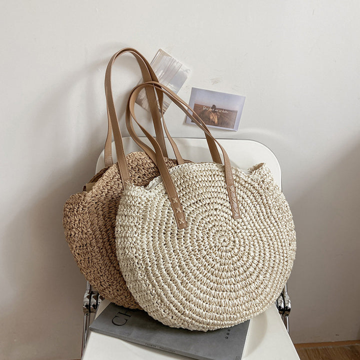 Håndlaget rundstrandbag Skanto