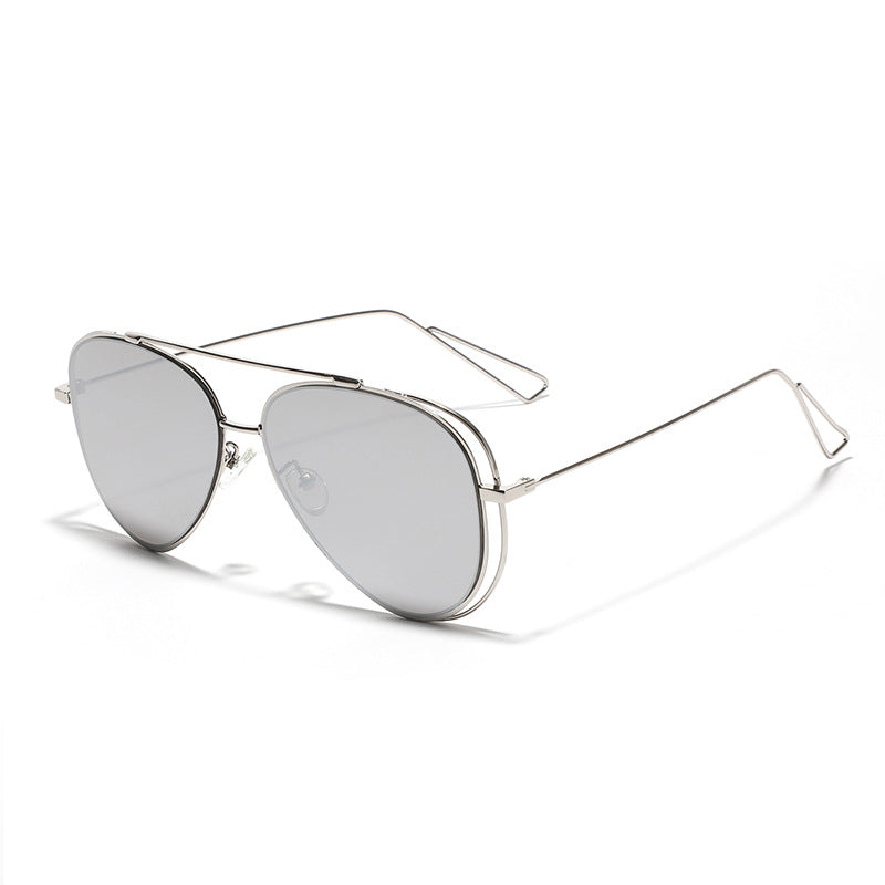 Dame Retro-flyger solbrille med sølvfarget metallramme og speilglass Skanto