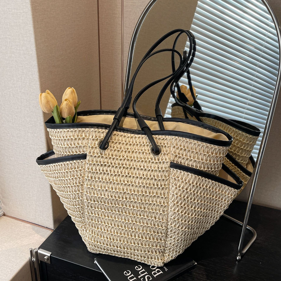 Romslig bast-handletote med elegante lær-detaljer Skanto