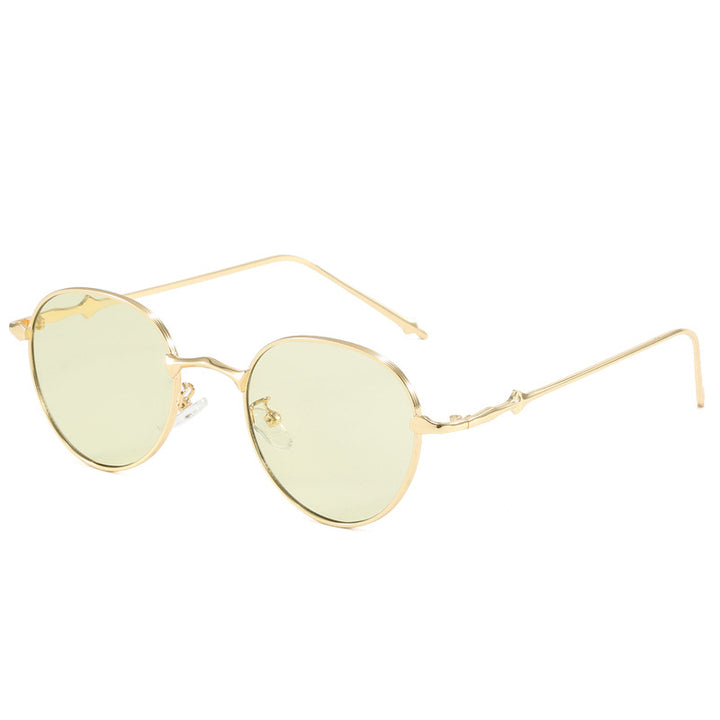 Dame elegante runde solbriller med moderne metallramme Skanto